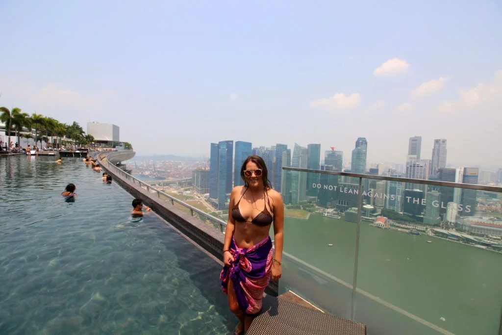 Beautiful girl at marina bay sands infinity pool