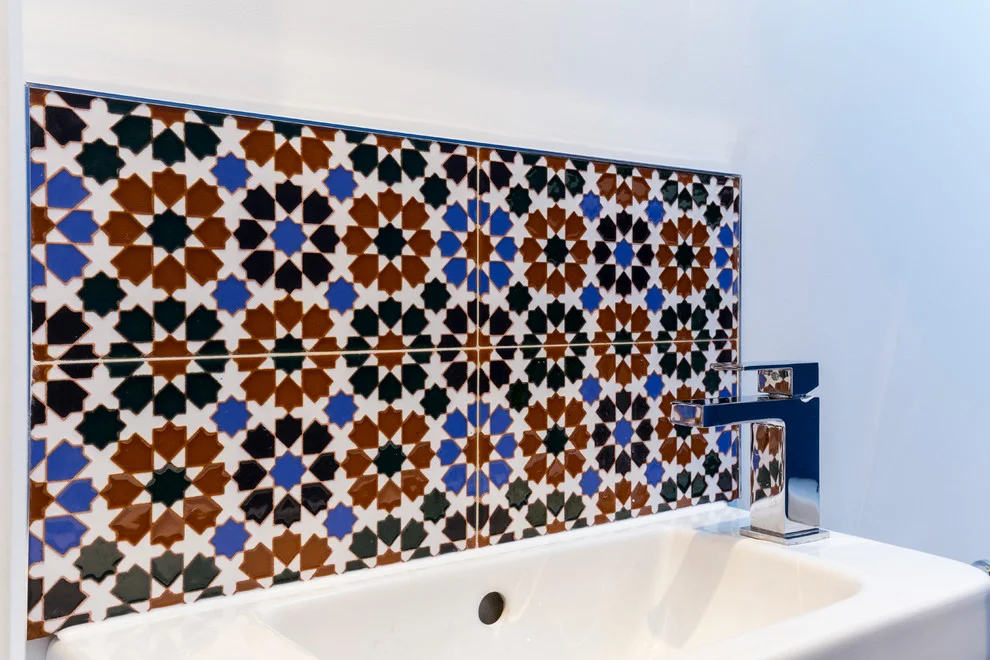 Bathroom tiles behind sink