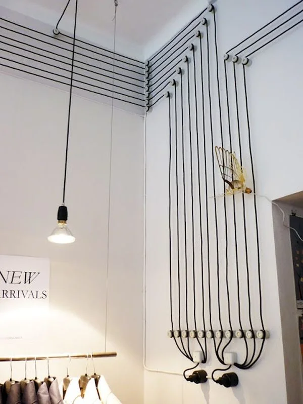 lot of black cables wall art