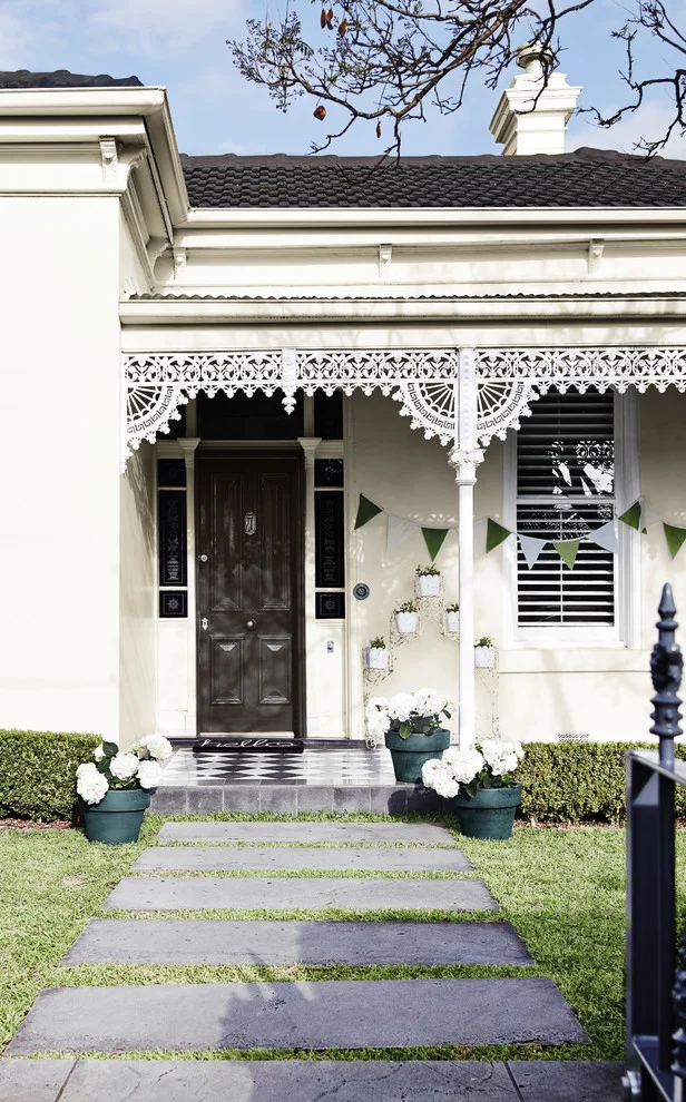 Limed White Exterior Paint With Dark Chocolate Color on Roof and Door