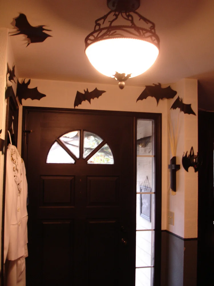 halloween bats and spider webs doorway