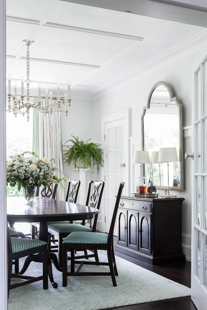 Dark Floor Covering up With Area Rug in Dining Room