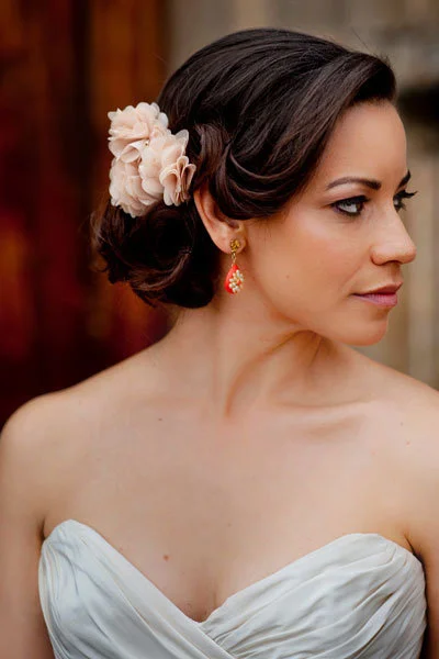 Side Swept Bun With a Pale Pink Bloom