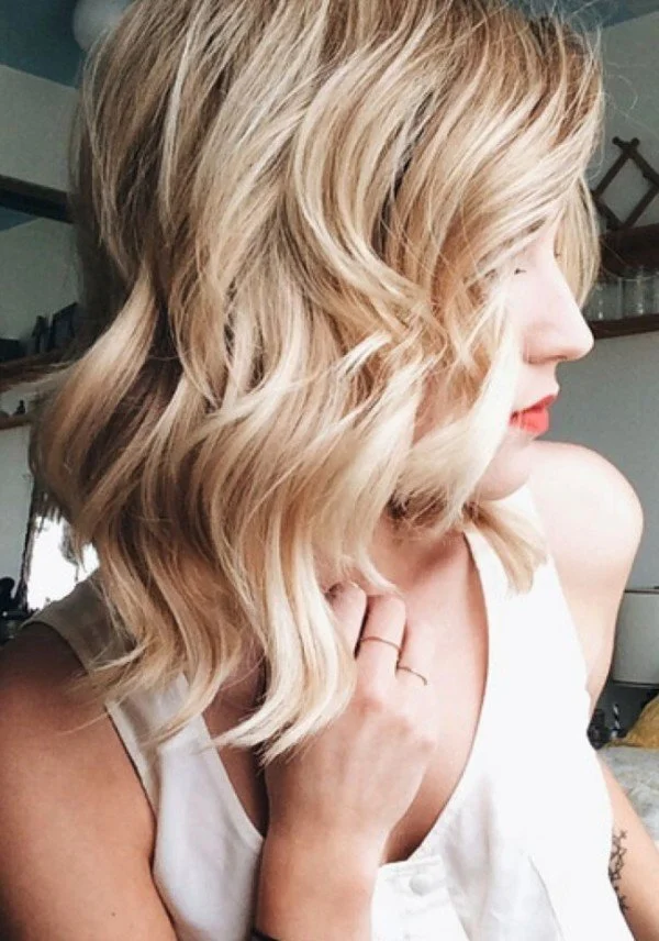 Cute, Asymmetrical Blonde Wavy