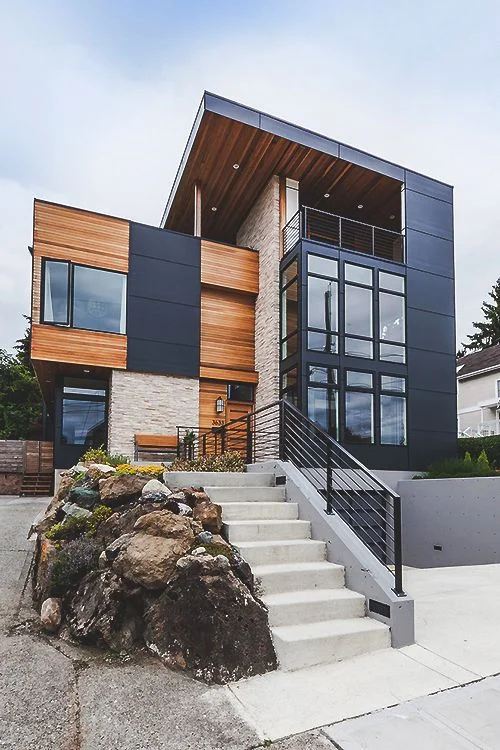 Large Gray Mixed Siding Flat Roof