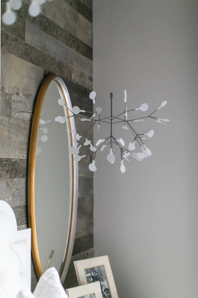Round Wall Mirror on Wood Wall