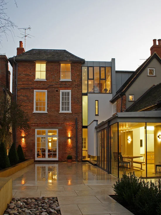 Trendy Brick Exterior Home With Hip Roof