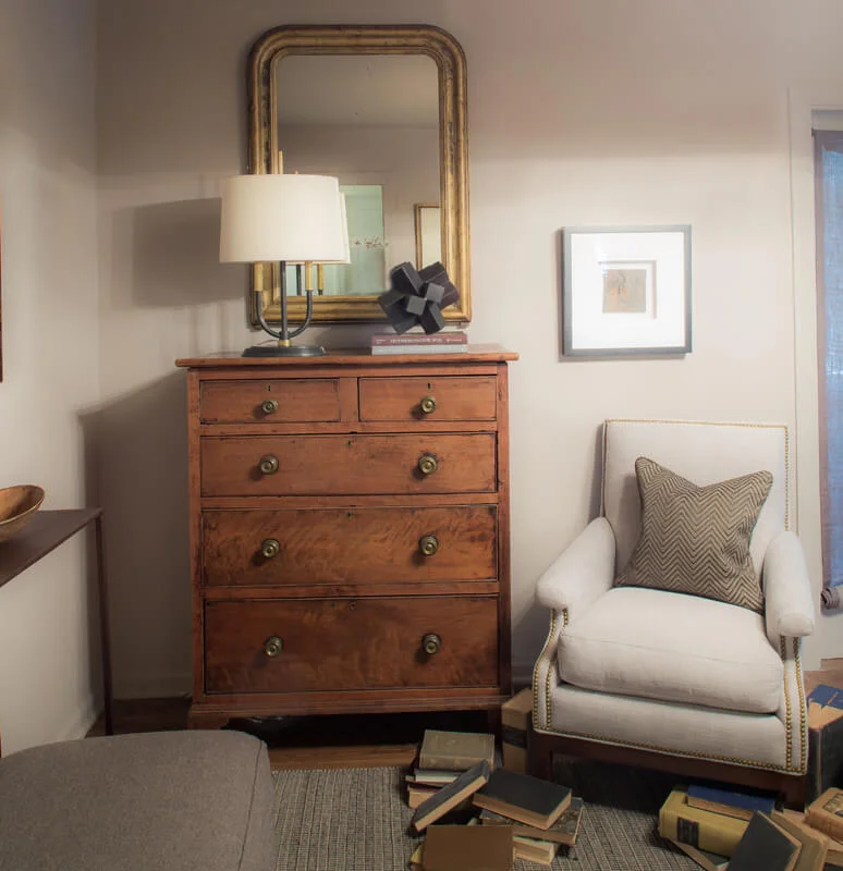 antique chest of drawer and lamp