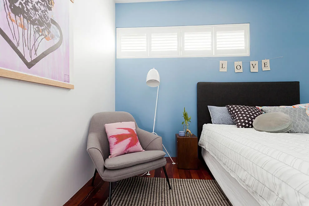 blue wall white window shutters