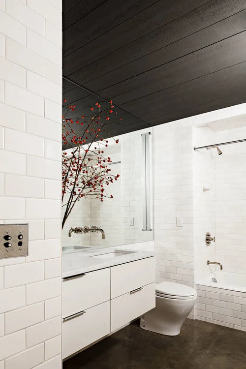 wooden beams white tiles bathroom