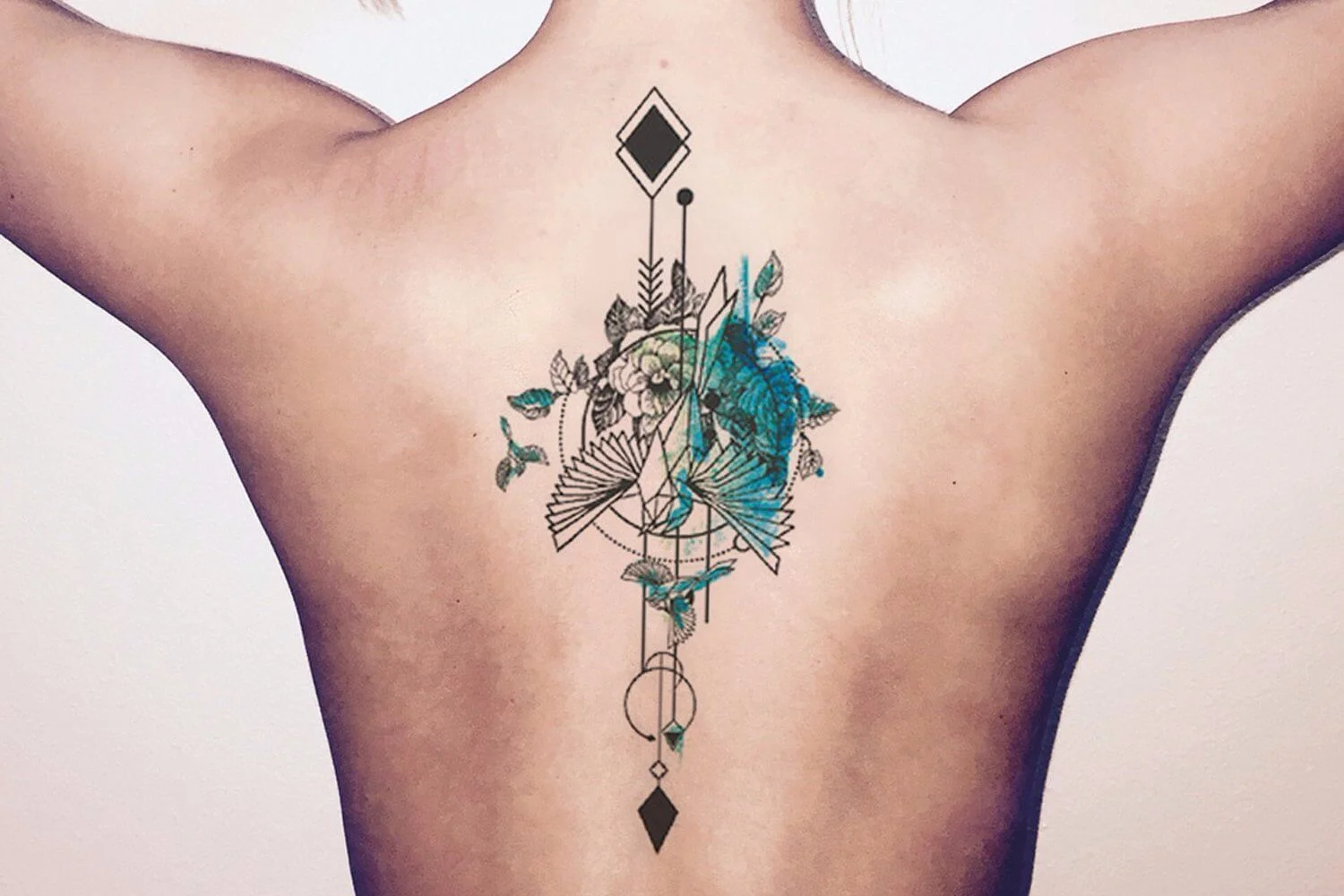 Arrow Watercolor Tattoo