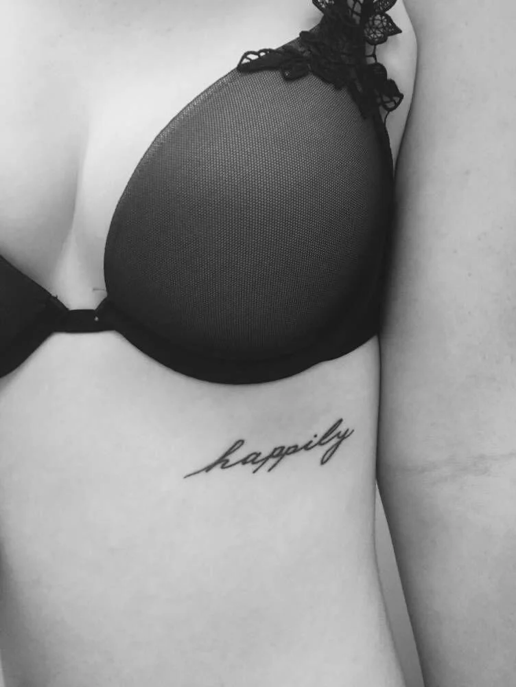 Small Under Breast Tattoo