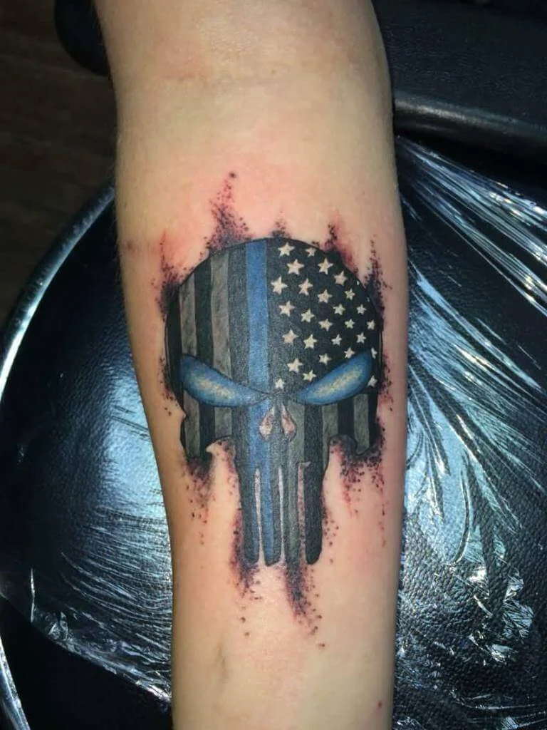 Punisher Tattoo on Inner Forearm