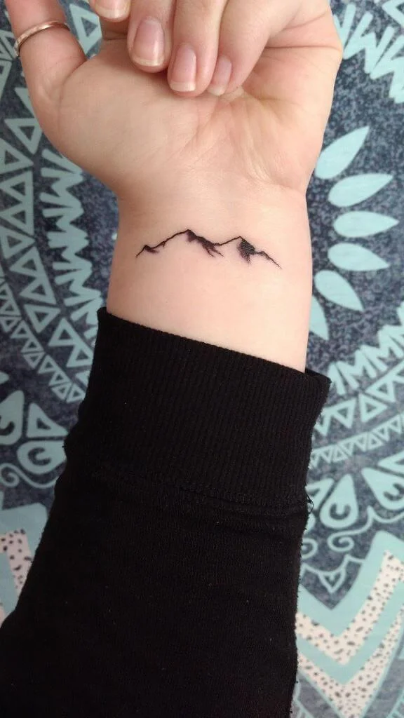 Simple Mountain Tatoo on Wrist