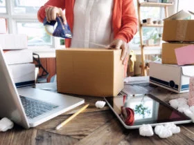 Young startup entrepreneur small business owner working at home, packaging and delivery situation.